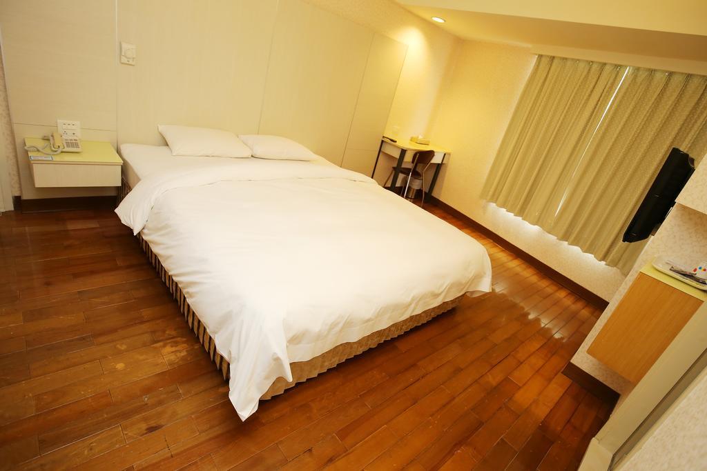 Tai Shinu Hotel Доулю Номер фото